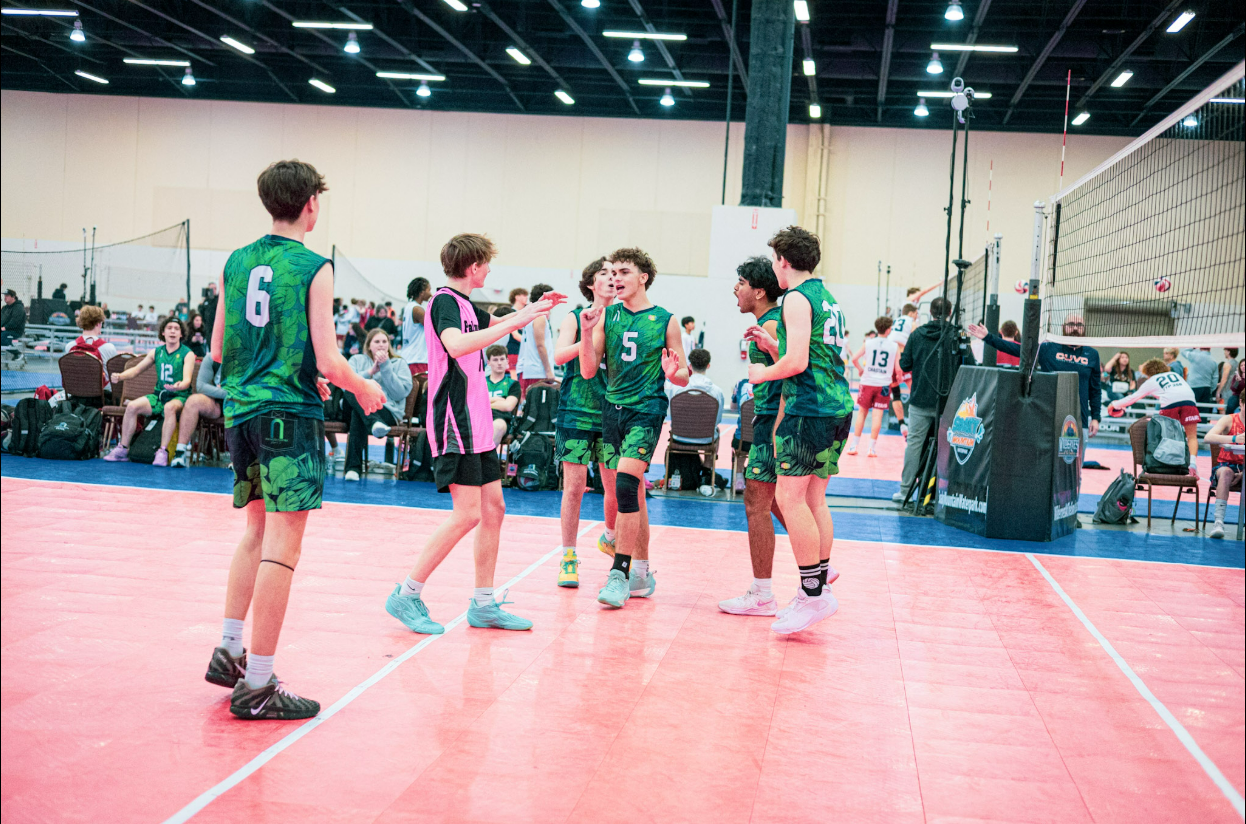 Palmetto Shore players celebrating together on court