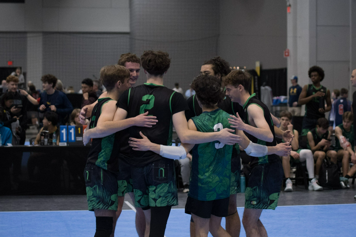 Palmetto Shore players gather in a team huddle